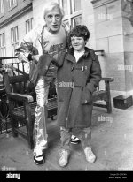 jimmy-savile-meets-seven-year-old-lee-claffey-of-eastwood-gardens-ERXCNA.jpg